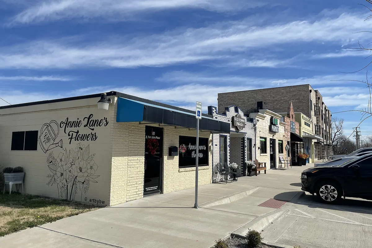 Buildings along a street in downtown Fate, Texas